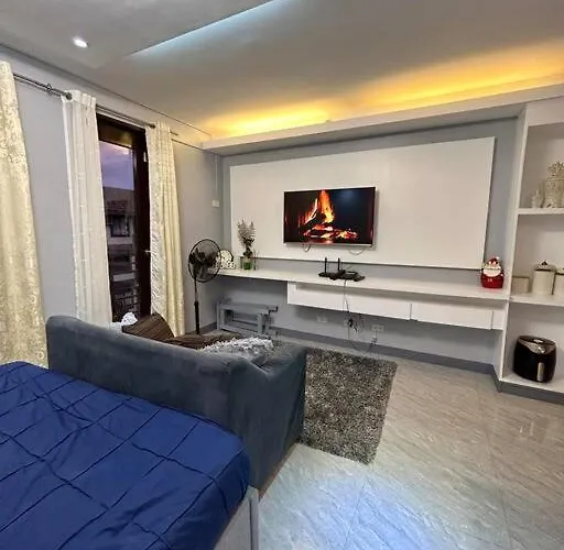 Racky's Condotel - Type With Vibe Manila